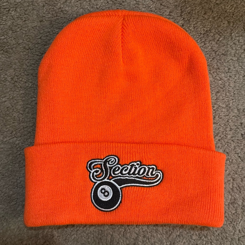 Section 8, bright orange beanie